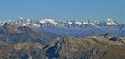61 Zoom verso le cime innevate di Val Camonica